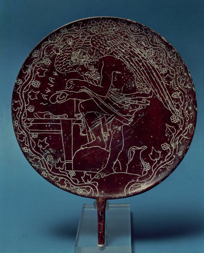 Back of a bronze mirror decorated with a scene showing an old man examining the liver of an animal, bears the name of Chalenas by Roman